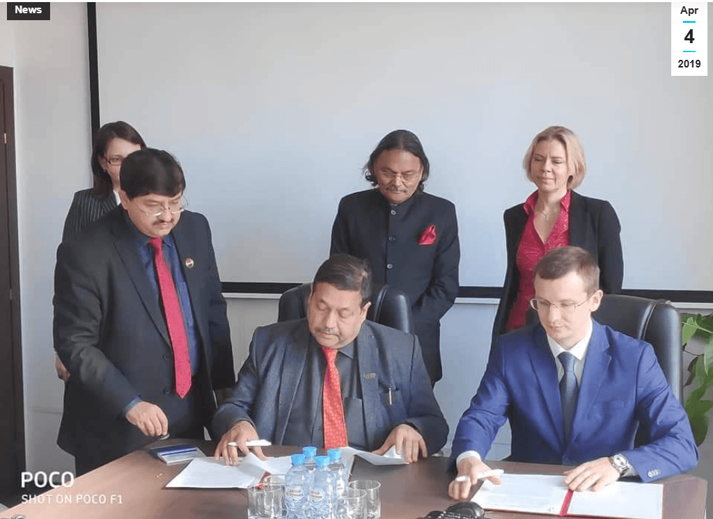 IICCI bilateral agreement signing with leadership at conference table